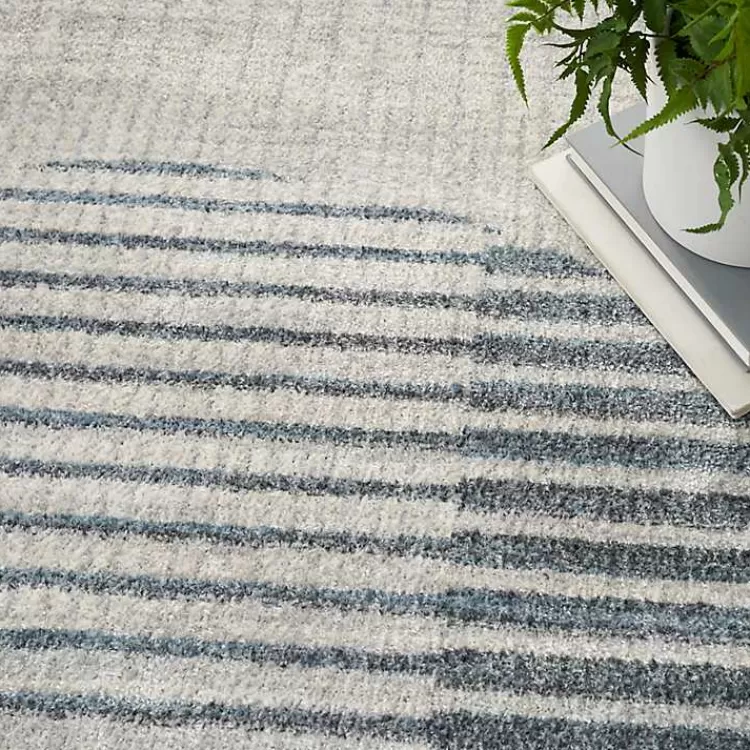 blue_and_ivory_half_moon_washable_area_rug_x_6.webp Blue and Ivory Half Moon Washable Area Rug, 5x7>Kirklands Home Flash Sale