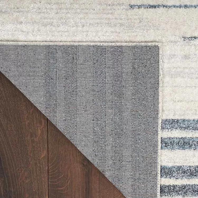 blue_and_ivory_striped_moon_area_rug_x_2.webp Blue and Ivory Striped Moon Area Rug, 9x12>Kirklands Home Sale