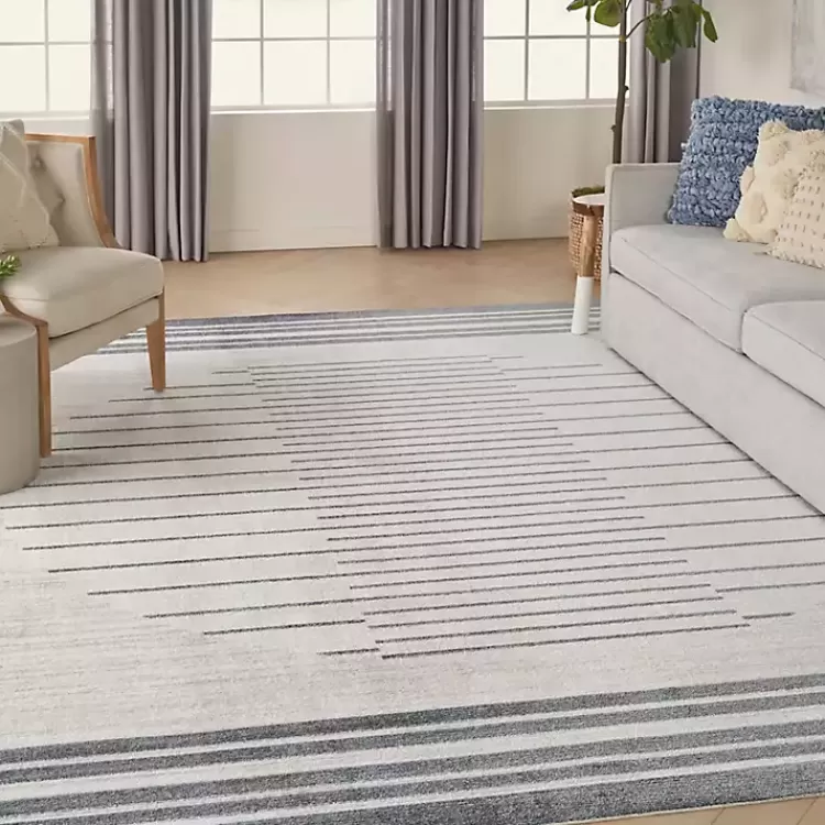 blue_and_ivory_striped_moon_area_rug_x_5.webp Blue and Ivory Striped Moon Area Rug, 9x12>Kirklands Home Sale