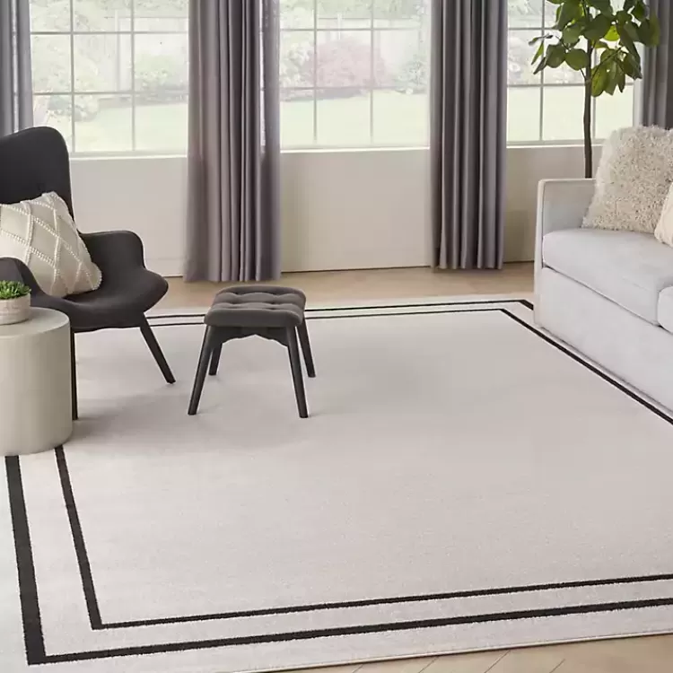 ivory_bordered_indooroutdoor_area_rug_x_6-1.webp Bordered Indoor/Outdoor Area Rug, 8x10>Kirklands Home Best Sale