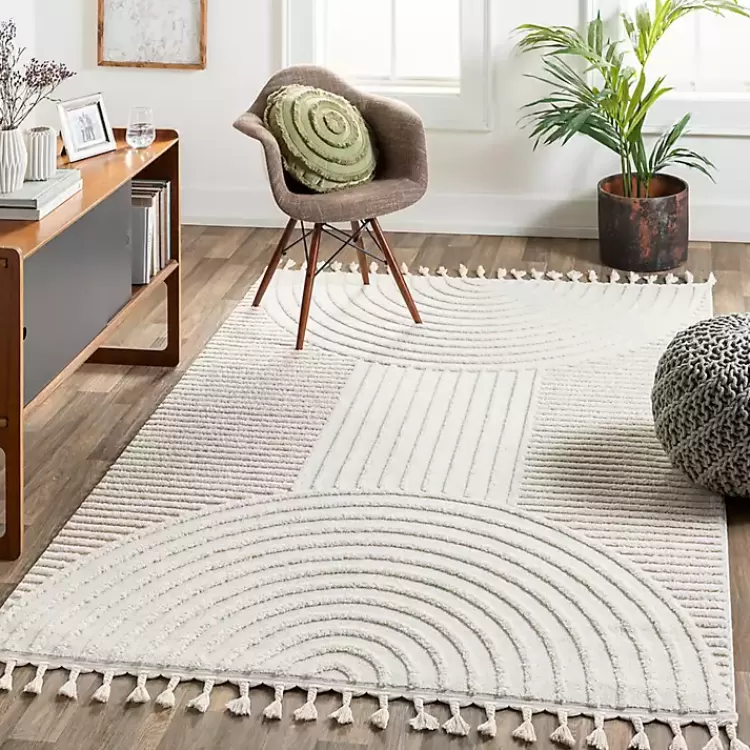 ivory_geometric_lines_tassel_area_rug_x_5.webp Geometric Lines Tassel Area Rug, 6x9>Kirklands Home Sale