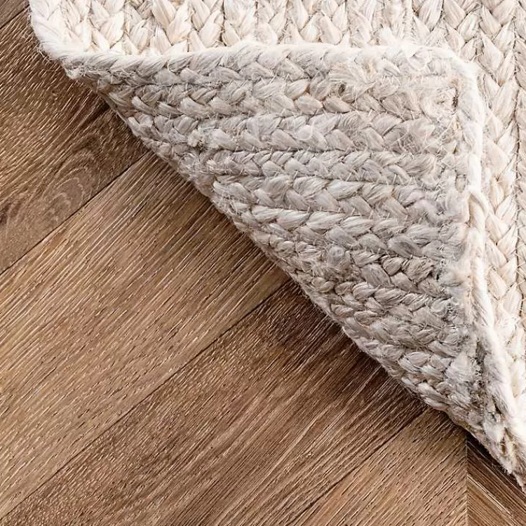 ivory_hand_woven_rigo_jute_area_rug_x_8.webp Hand Woven Rigo Jute Area Rug, 9x12>Kirklands Home Store