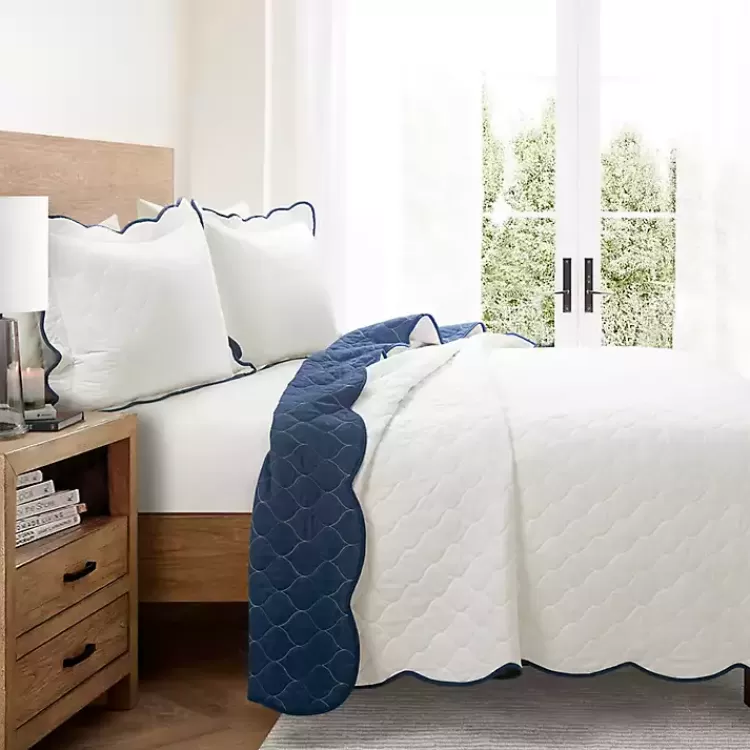 white_and_navy_scallop_pc_king_quilt_set_2.webp White and Navy Scallop 3-pc. King Quilt Set>Kirklands Home Fashion