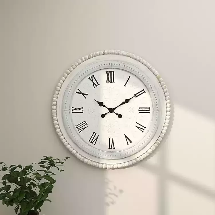 white_distressed_wood_round_beaded_wall_clock_6.webp White Distressed Wood Round Beaded Wall Clock>Kirklands Home Sale