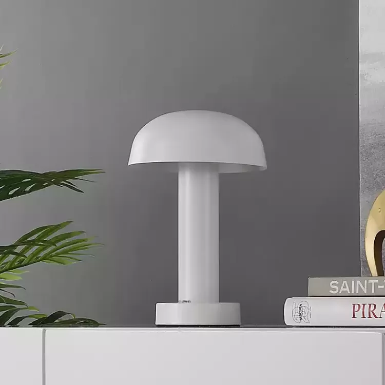white_metal_led_cordless_touch_lamp__in_4.webp Metal LED Cordless Touch Lamp, 10 in.>Kirklands Home Outlet